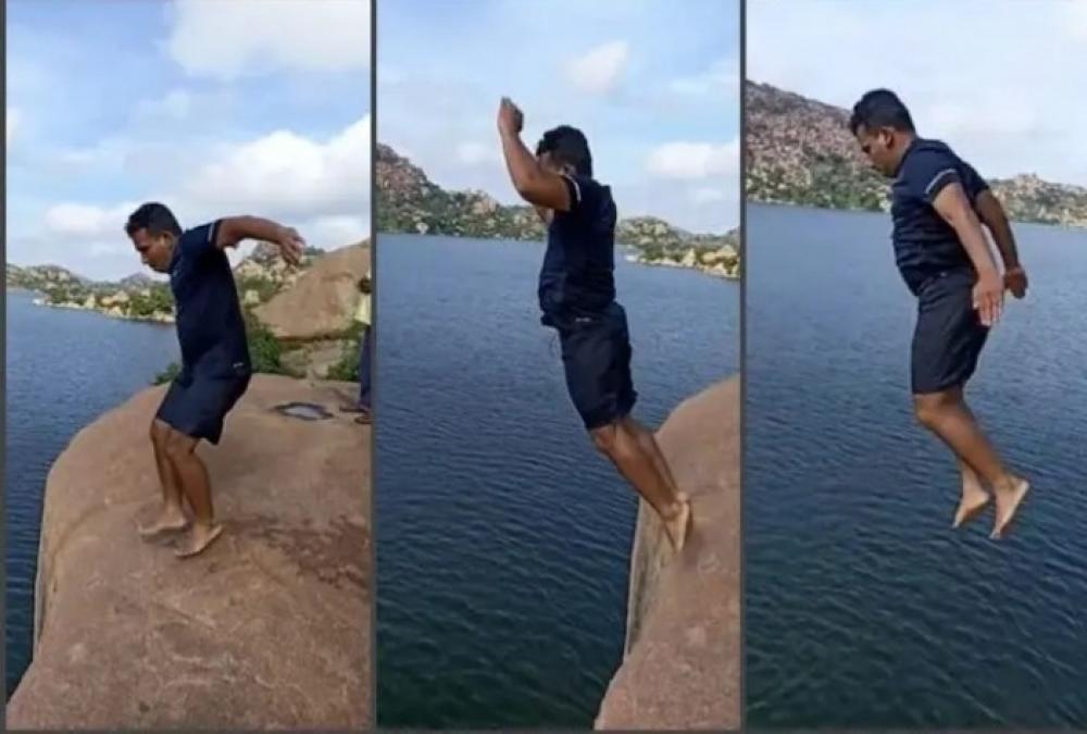 The Weekend Leader - K'taka DC dives from a hill into Sanapura reservoir, video goes viral